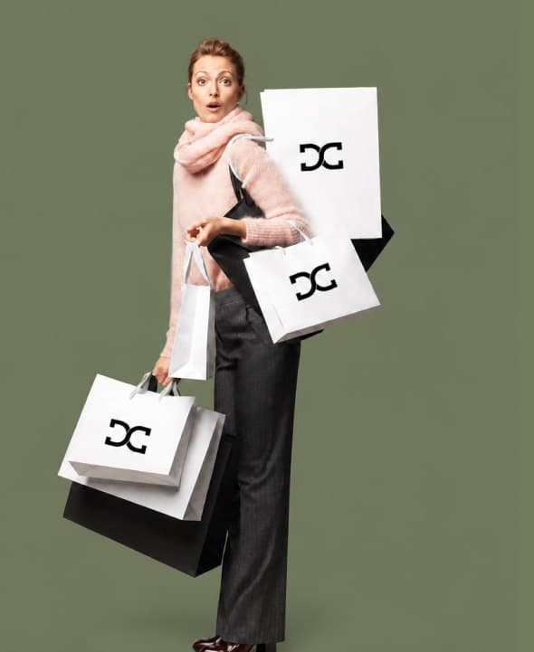 Model carrying Desired Clothes shopping bags