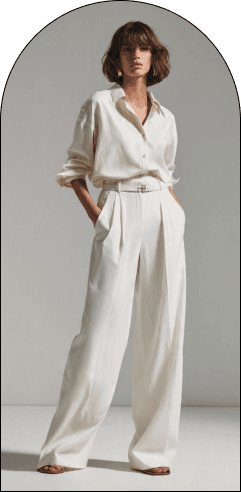Model in a white tailored outfit