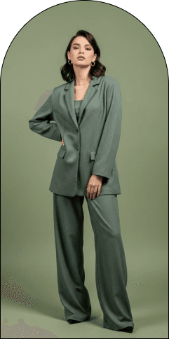 Model in a sage green suit